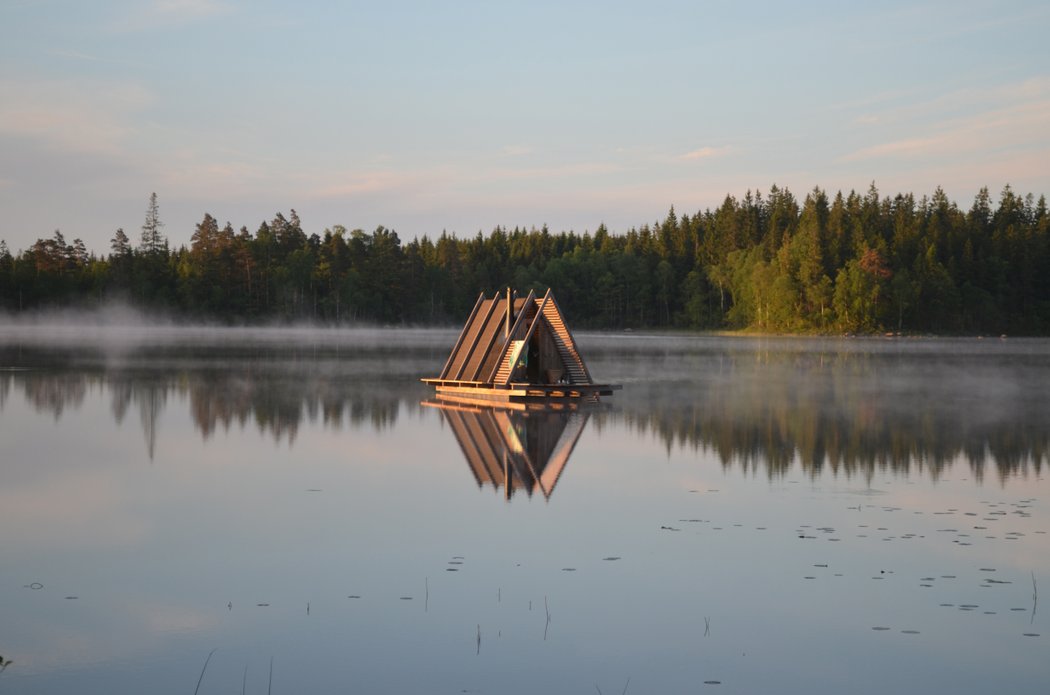 A floating sauna on a lake