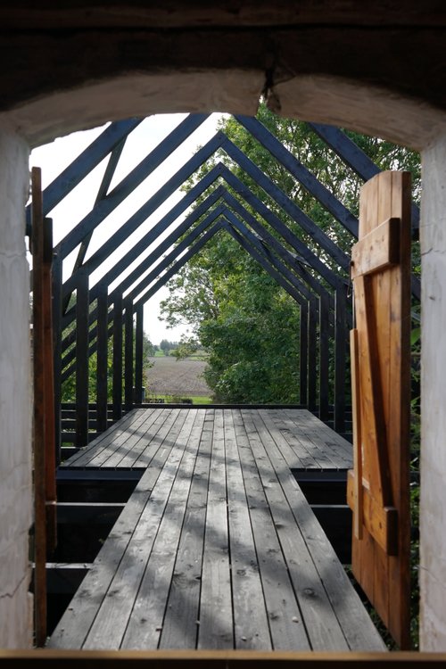 A roof terrace with a bridge